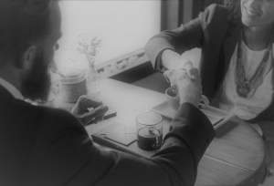 hand shaking man, woman, reduced, bw